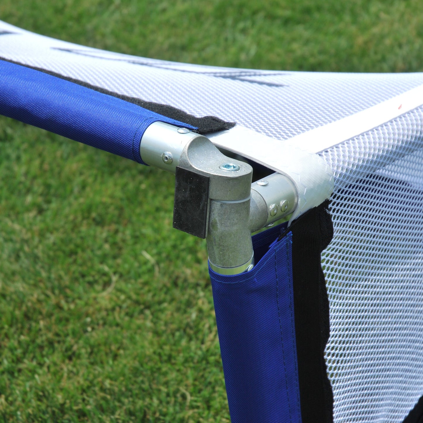 Close-up of Alpha Gol V1 rubber foot padding, silver aluminum frame