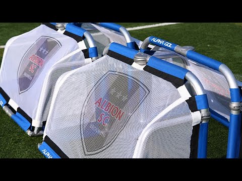 Promotional video of the Alpha Gol folding soccer goal in use on a field
